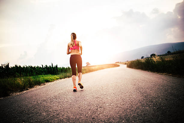 istock Fitness woman jogging 601933686