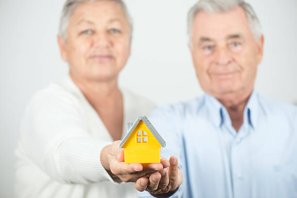 istock Happy Senior Couple Buying Home 601934324