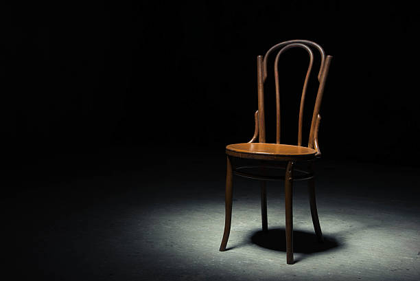 istock Lonely chair at the empty room 601934658