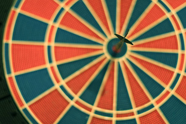 istock Darts arrows in the target center. 601939098