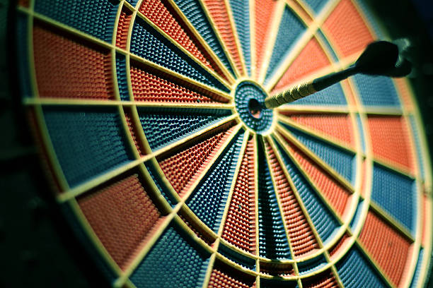 istock Darts arrows in the target center. 601939164