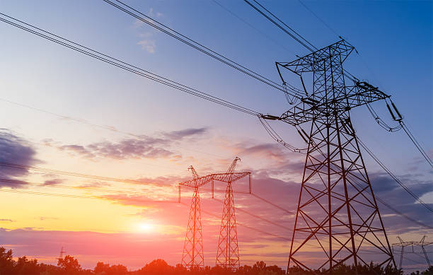 istock Electricity pylons and lines beautiful sky 601941440