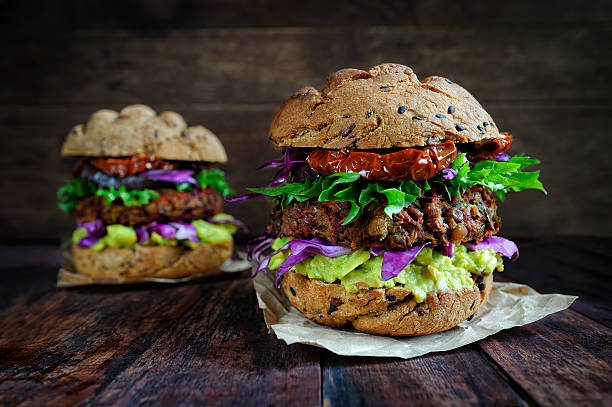 Hamburger vegetarian food and salad close up