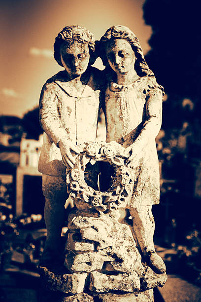 istock Stone statue in the cemetery 601946158