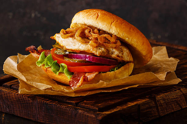 istock Burger with chicken breast and fried onions 601946990