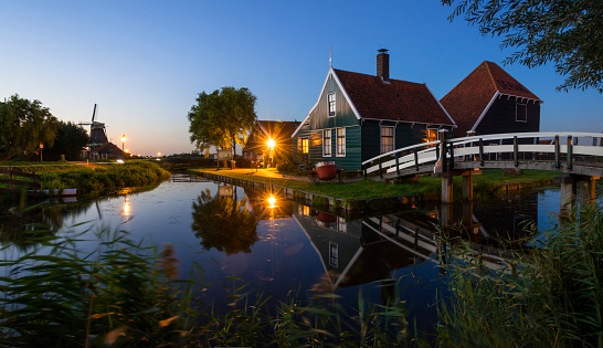 A view to Zaanse Schans, a main touristic attraction in the Netherlands, during twilight.