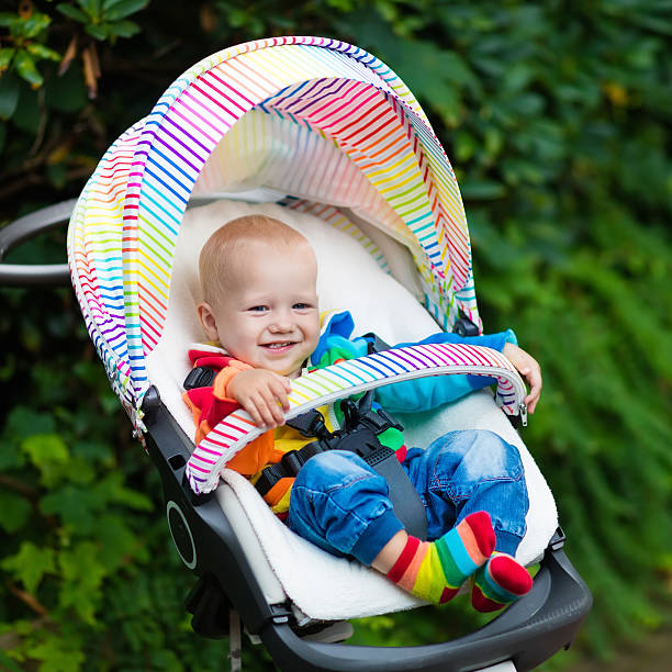 istock Baby boy in colorful stroller 602289786