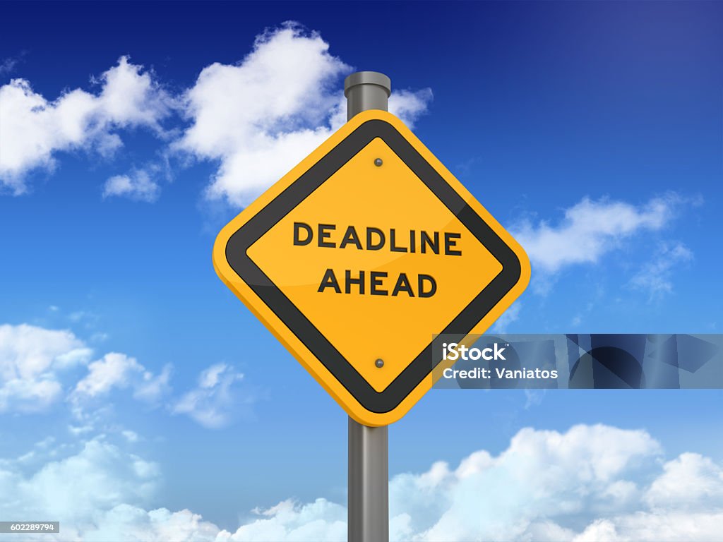 Road Sign Series - DEADLINE AHEAD DEADLINE AHEAD Road Sign on Blue Sky and Clouds Background Deadline Stock Photo