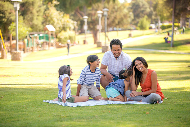 istock Ethnic family playing together on a blanket 602294018