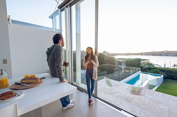 istock Couple having breakfast together at home. 602295272
