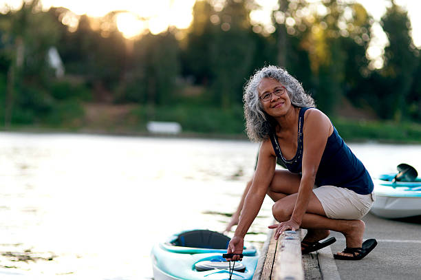 istock Elderly woman ready to kayak 602295532