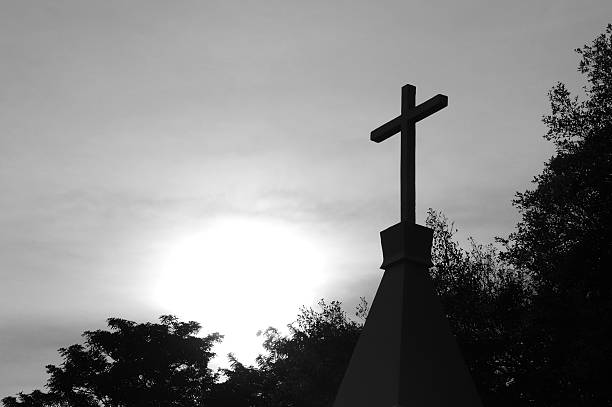 istock Silhouette of Christian cross 602297132