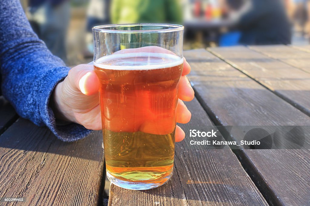 Adult man drinking beer in summer Summer Stock Photo