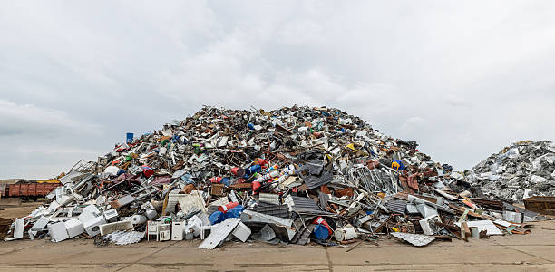istock Dumping ground. Scrap metal heap. Compressed crushed cars for recycling 602300844