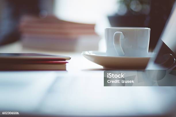 Cup Of Coffee On The Desk Stock Photo - Download Image Now - Book, Coffee - Drink, Coffee Shop