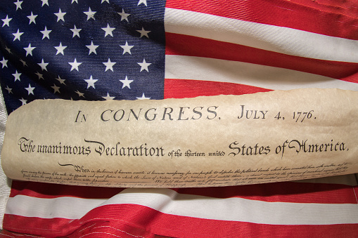 American Declaration of independence 4th july 1776 on usa flag background