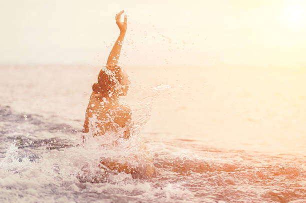 istock Beautiful woman on a beach. 602310588