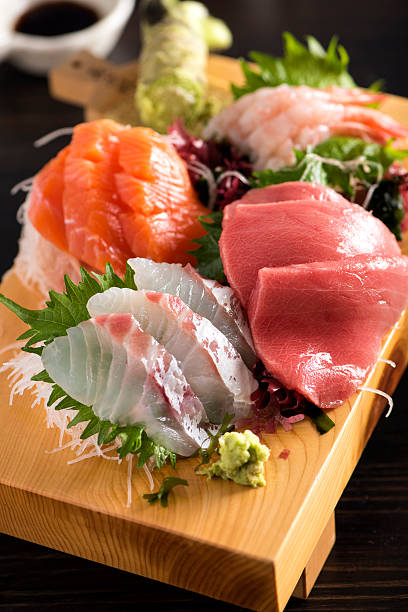 Sashimi Plate Sashimi Plate. Selective Focus shiso photos stock pictures, royalty-free photos & images