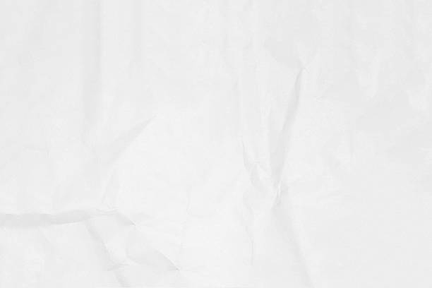 istock Crumpled white paper texture or paper background for design. 602312646