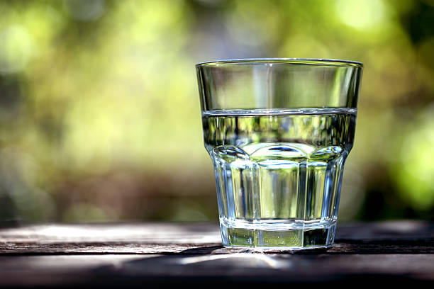 Glass of water stock photo