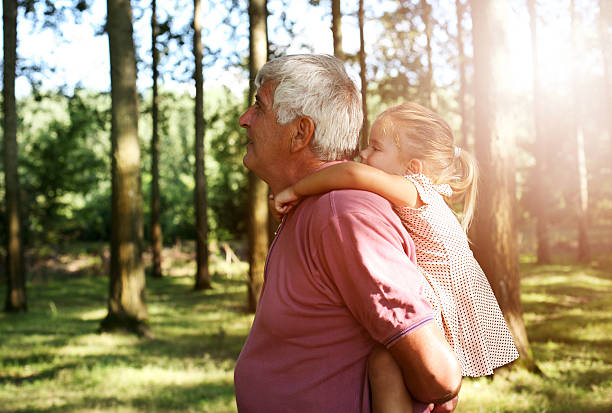 istock Granddaughter enjoying piggyback ride. 602313058