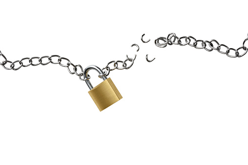 Broken chain with padlock isolated on white background with clipping path.