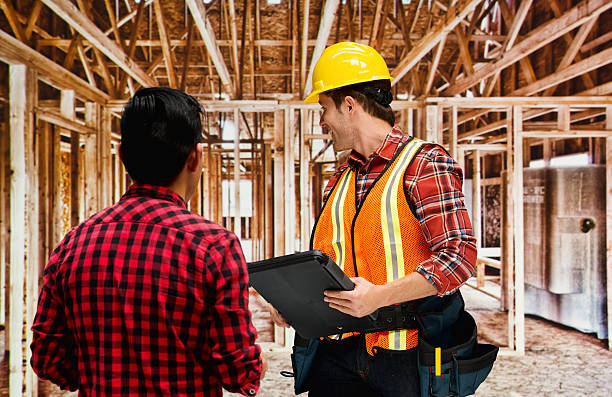 Building contractor discussion with customer Building contractor discussion with customerhttp://www.twodozendesign.info/i/1.png 24 x 24 frame stock pictures, royalty-free photos & images