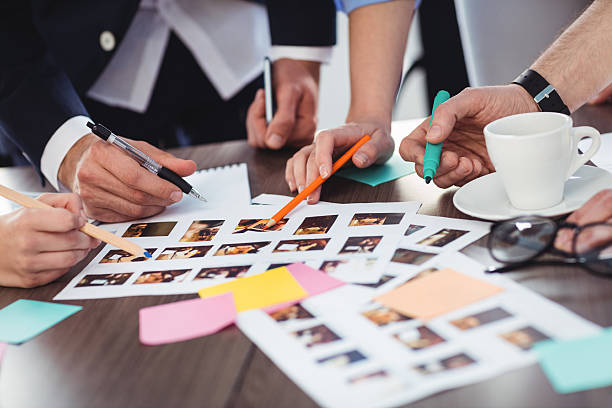 istock Cropped image of photo editors with documents 602320444