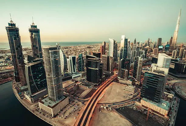 Photo of Scenic panoramic view of downtown Dubai modern architecture at sunset