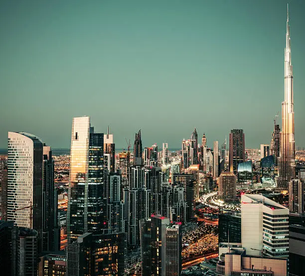 Photo of Scenic panoramic view of downtown Dubai modern architecture at sunset