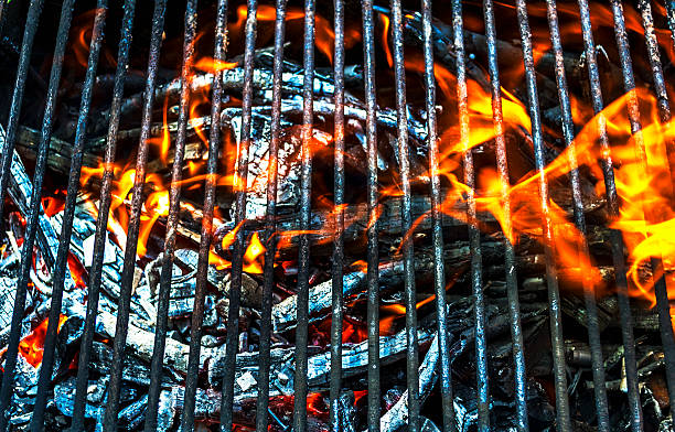 istock Empty Flaming Charcoal Grill With Flames Of Fire 602326136