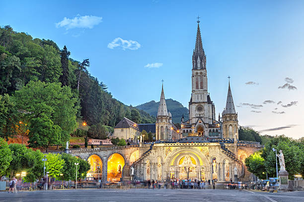 Rosary Basilica in the evening in Lourdes Rosary Basilica in the evening, Lourdes, Hautes-Pyrenees, France pilgrimage photos stock pictures, royalty-free photos & images