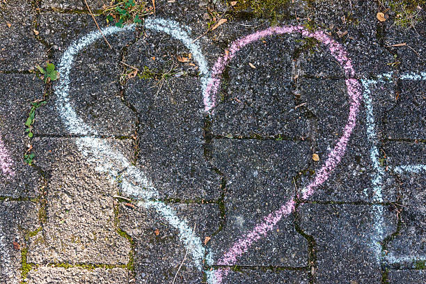 istock Sidewalk Concrete Stone Heart Chalk Drawing Children Playing Texture 602326898