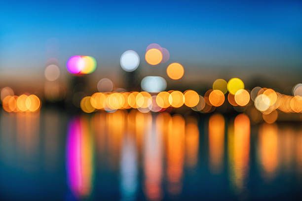 istock Defocused Image Of City At Night, water reflection 602328682