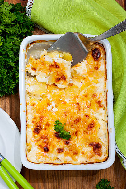 istock Gratin potatoes with cheese, top view 602328876
