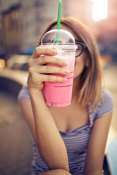 strawberry smoothie and whipped cream - hidding imagens e fotografias de stock