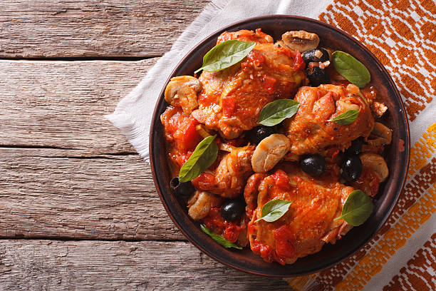 istock Italian Cacciatori chicken on a plate . horizontal top view 602331926