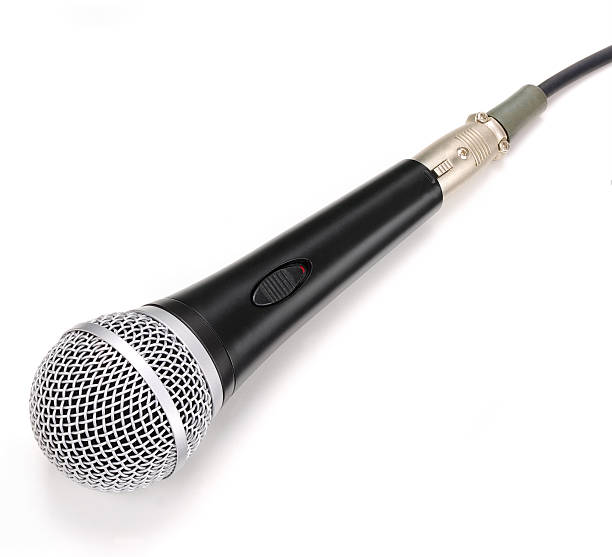 istock Close-up of a microphone on white. Contains clipping path. 602332564