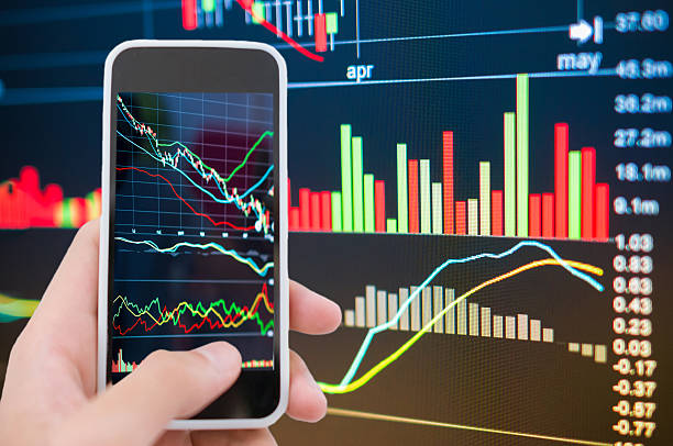 istock Asian Businessman using a smart phone analysis stock 602335296