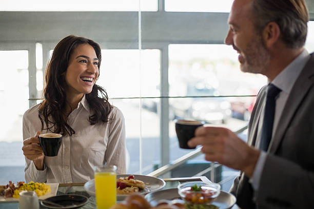 istock Business people having meal in restaurant 602335510