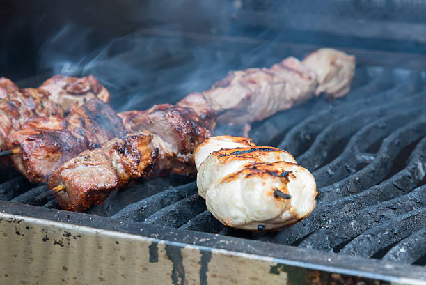 istock juicy hot shish kebab on the grill 602338024