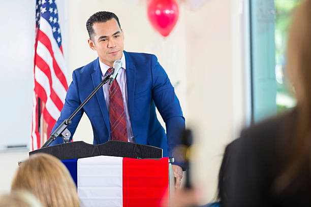 istock Hispanic man giving speech while running for political office 603151422