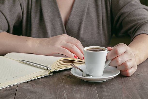 istock Cup of coffee on the desk 603151672