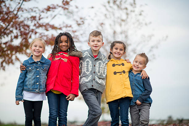 istock Children Playing Outside at the Park 603152146