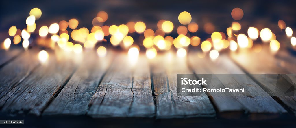 Bokeh Of Christmas Lights On Vintage Wood blurred lights on old wood Wood - Material Stock Photo