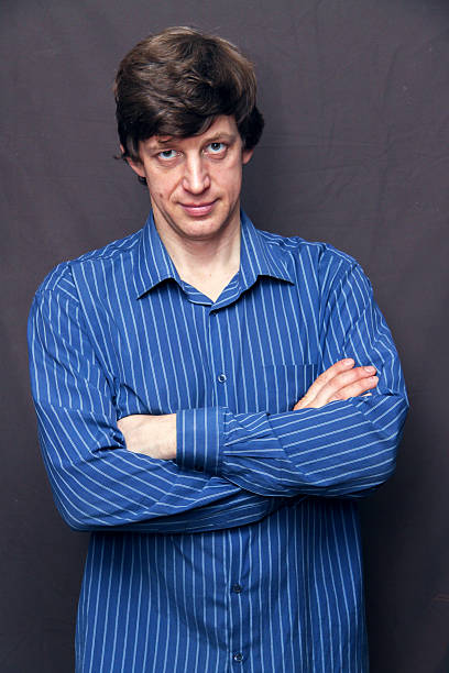 istock Handsome man with arms crossed 603153318
