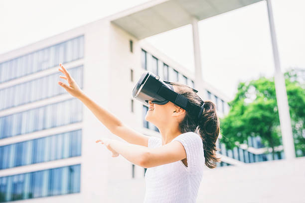 istock Young girl of 12 years Experiencing Virtual Reality 603154540