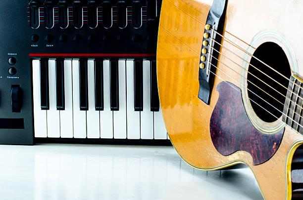 istock Acoustic guitar keyboard, close-up. 603154818