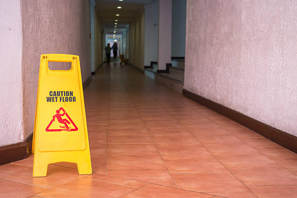 istock Warning sign on the floor in hotel corridor 603157484