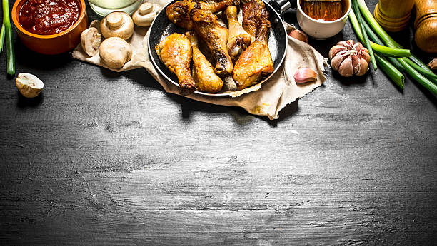 istock Fried chicken with mushrooms , garlic, onions 603161146